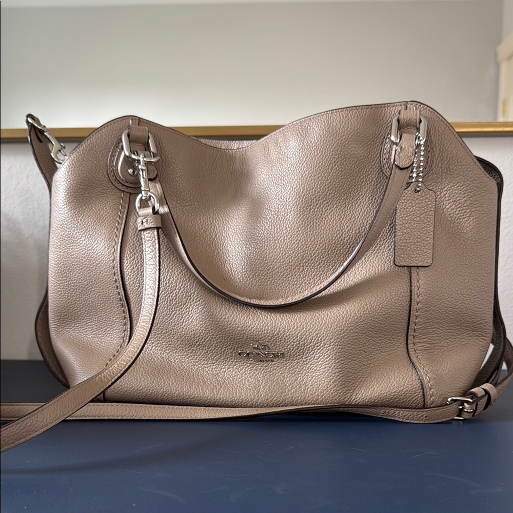 Coach Tan Shoulder Bag with Leather Finish and Versatile Straps